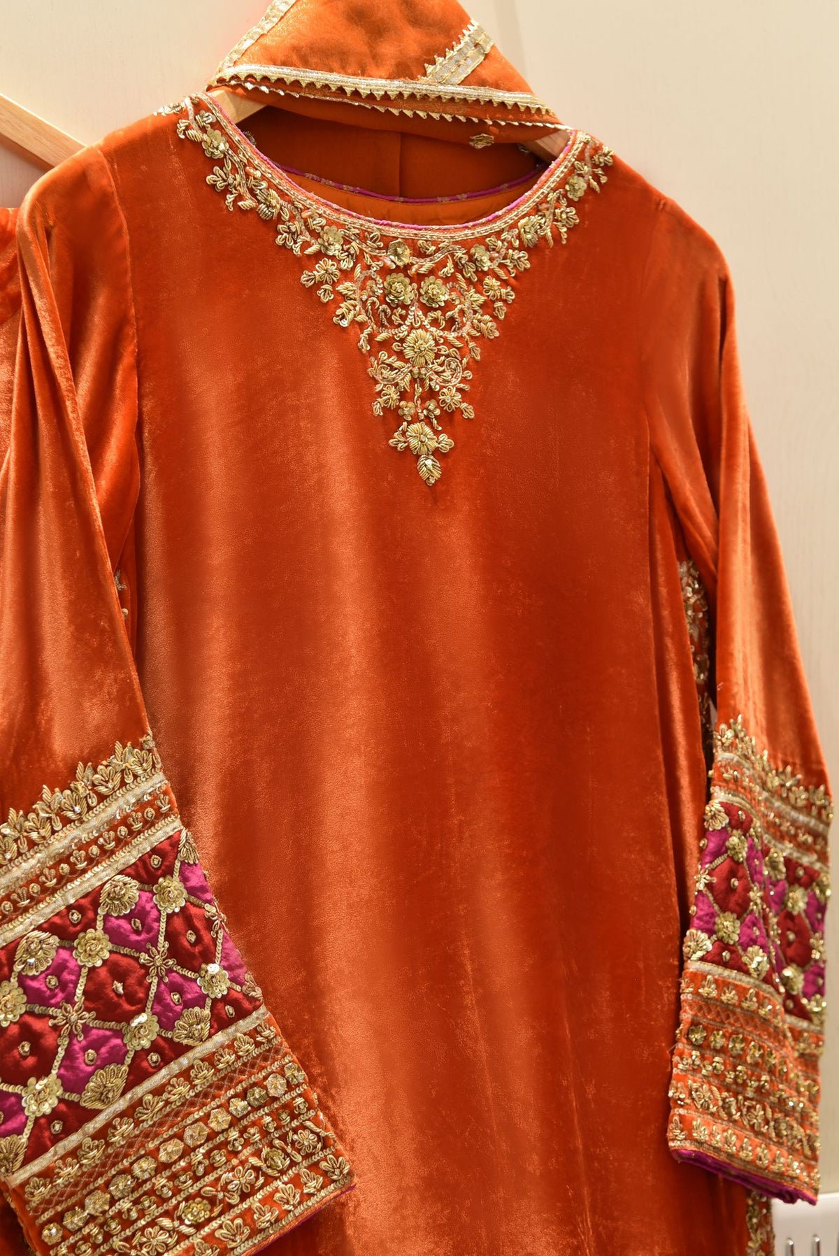 orange velvet dress pakistani Bold, bright, and beautifully regal. Our signature velvet outfit in a luminous orange hue, finished with intricate embellishment for a truly elevated festive look!